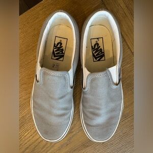 Gray Slip on Vans.